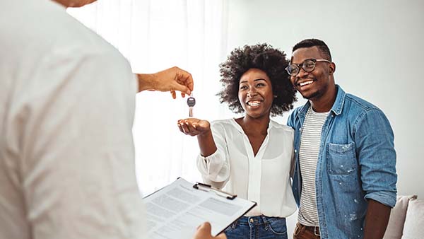 Couple getting house keys