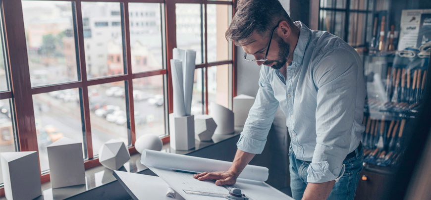 Architect reviewing plans