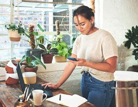 Small business owner viewing COI on phone