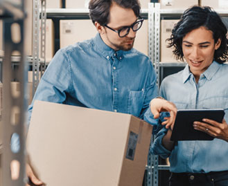 Coworkers reviewing inventory