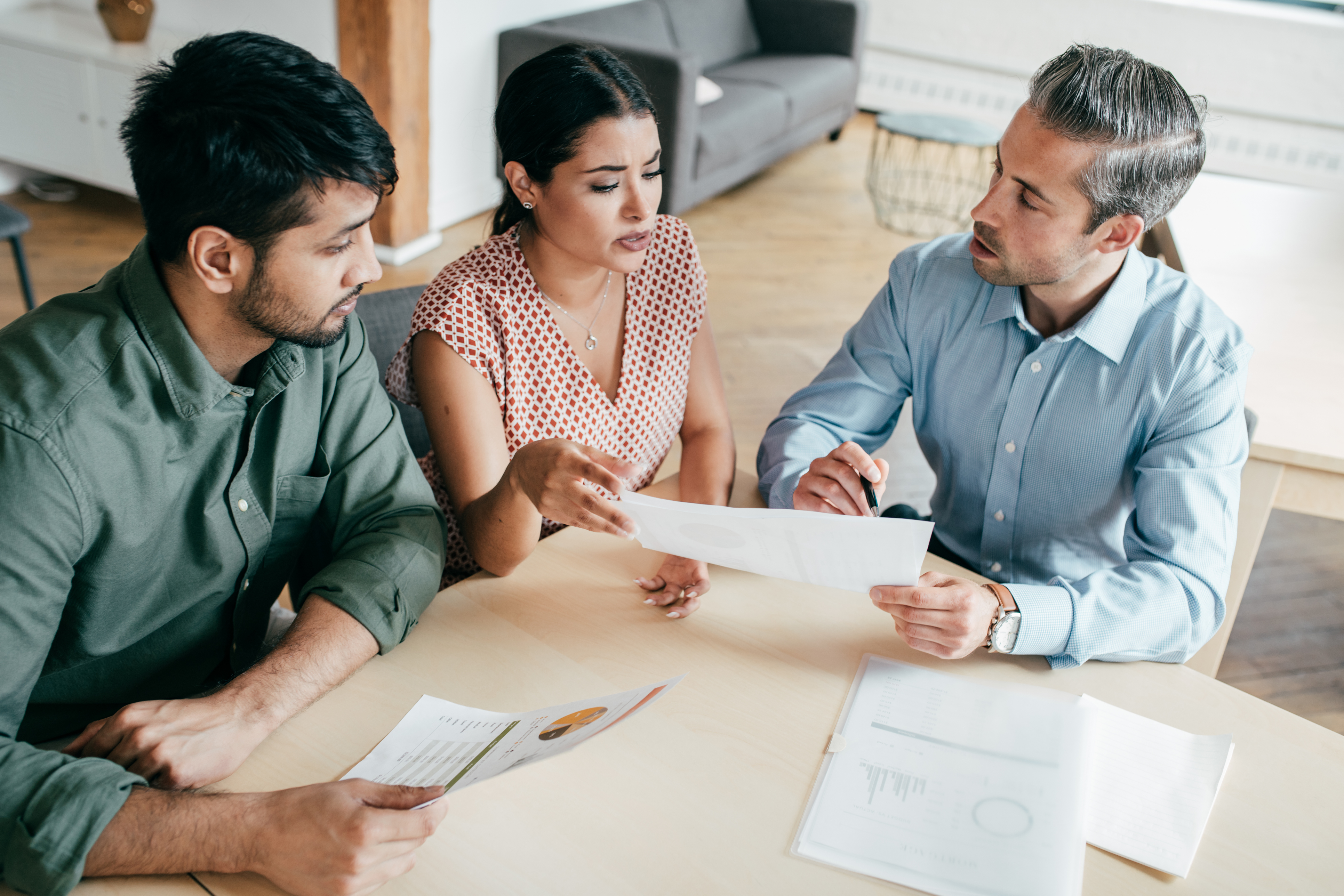 Individuals discussing liability insurance