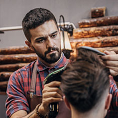 Barber cutting hair