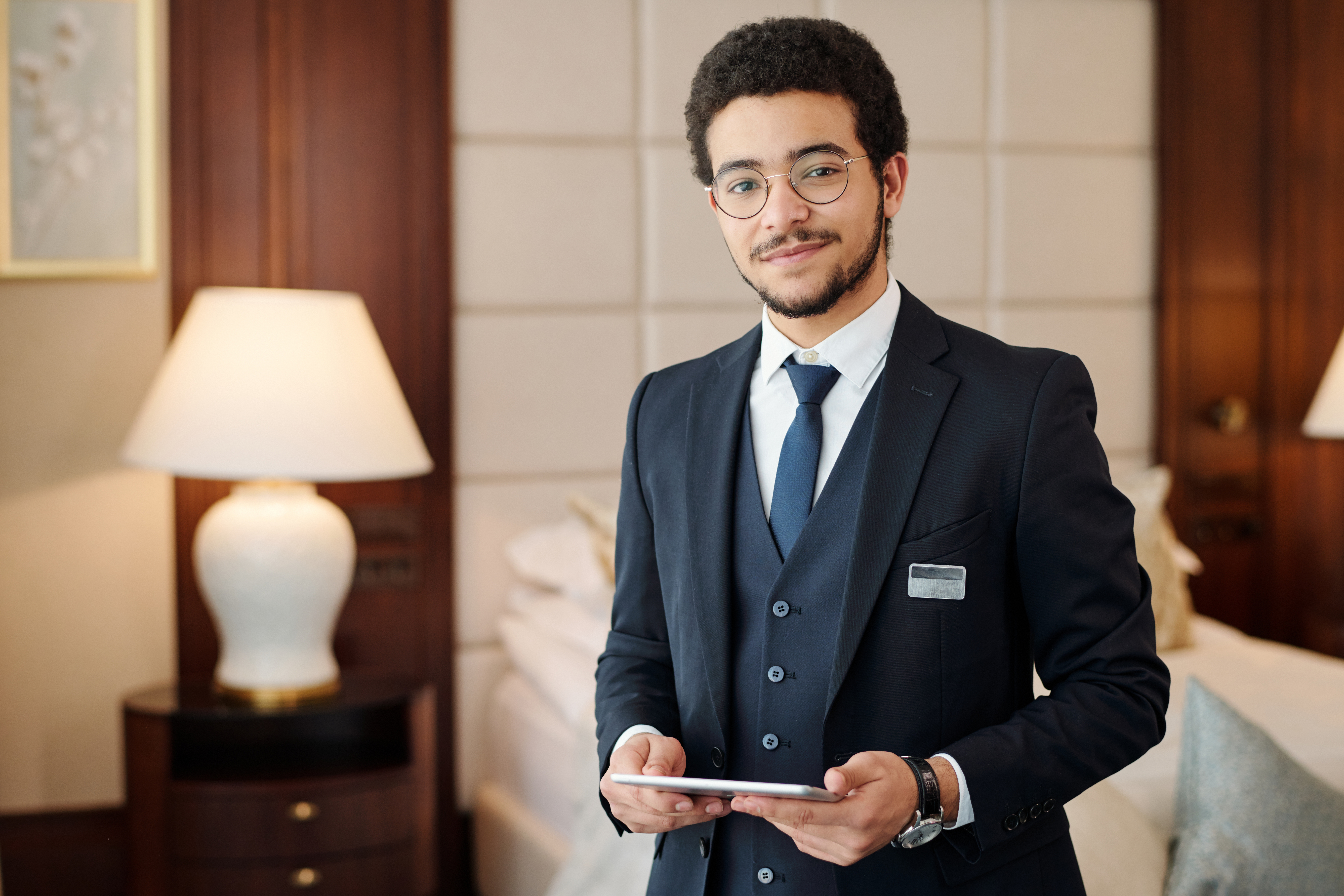 Hotel worker holding a tablet