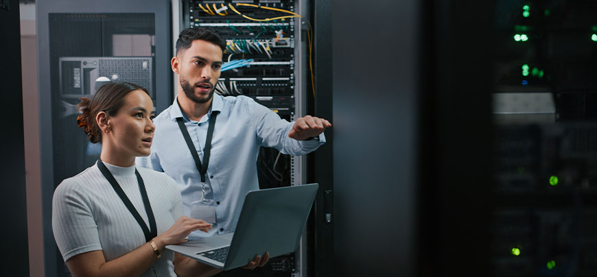 IT people looking at servers