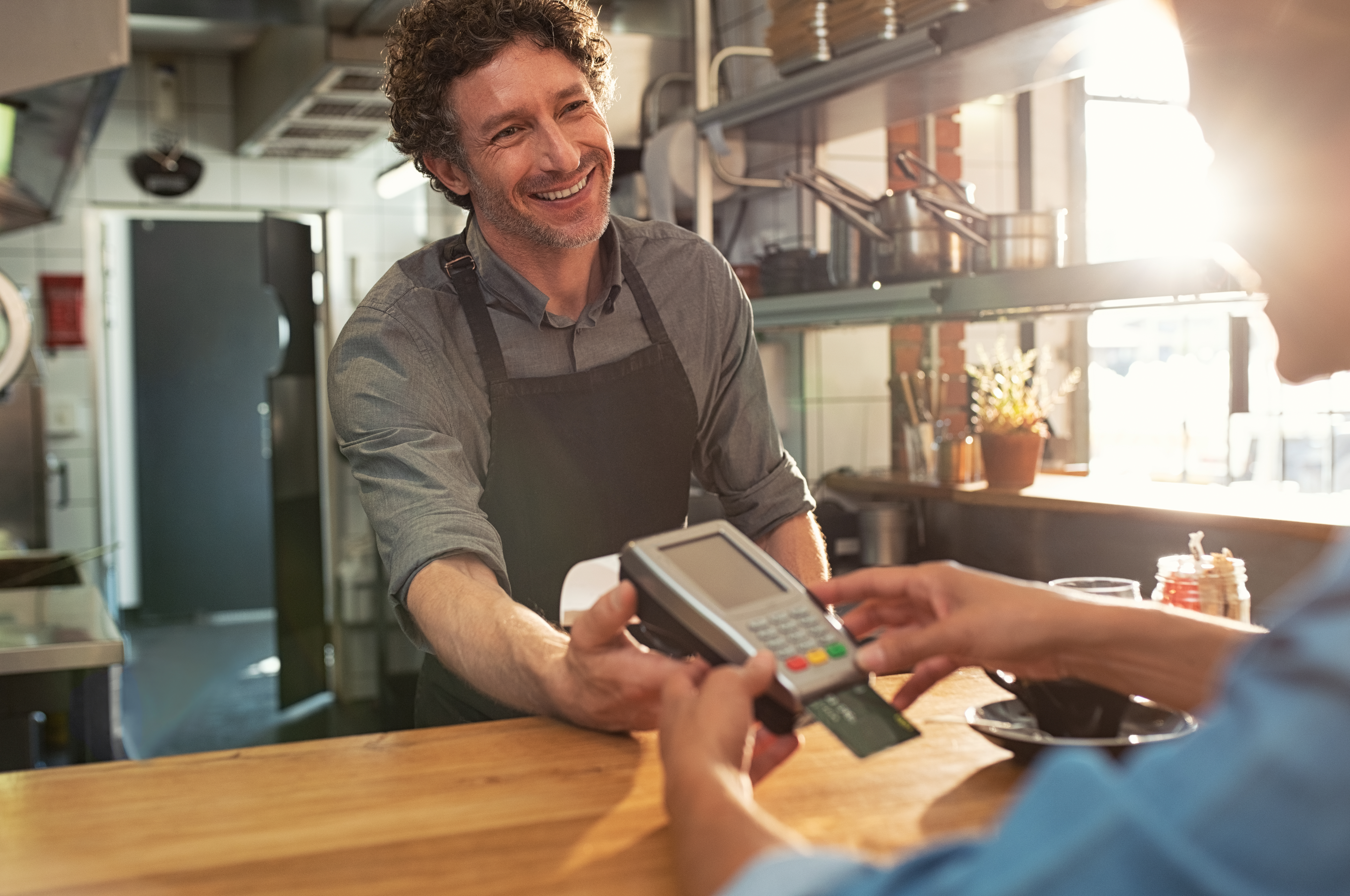 Worker charging customer credit card