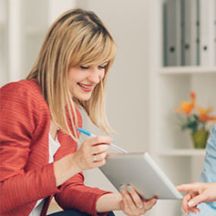 Woman looking at tablet