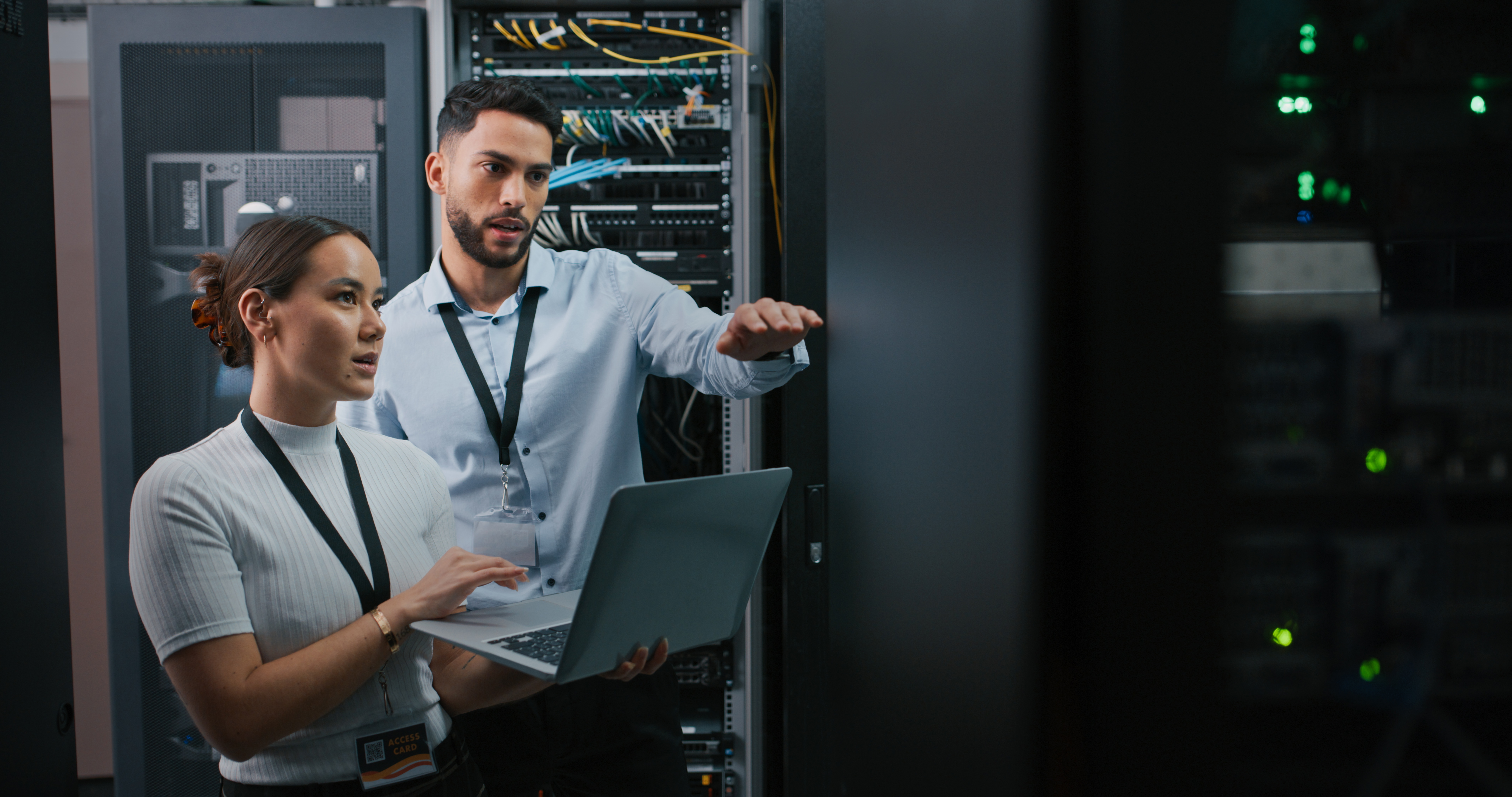 IT people looking at servers
