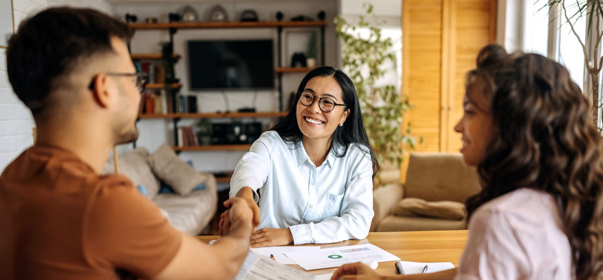 Insurance agent helping a couple
