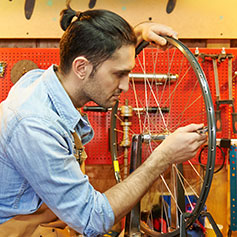 Male bike shop owner