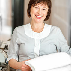 Happy maid with towel