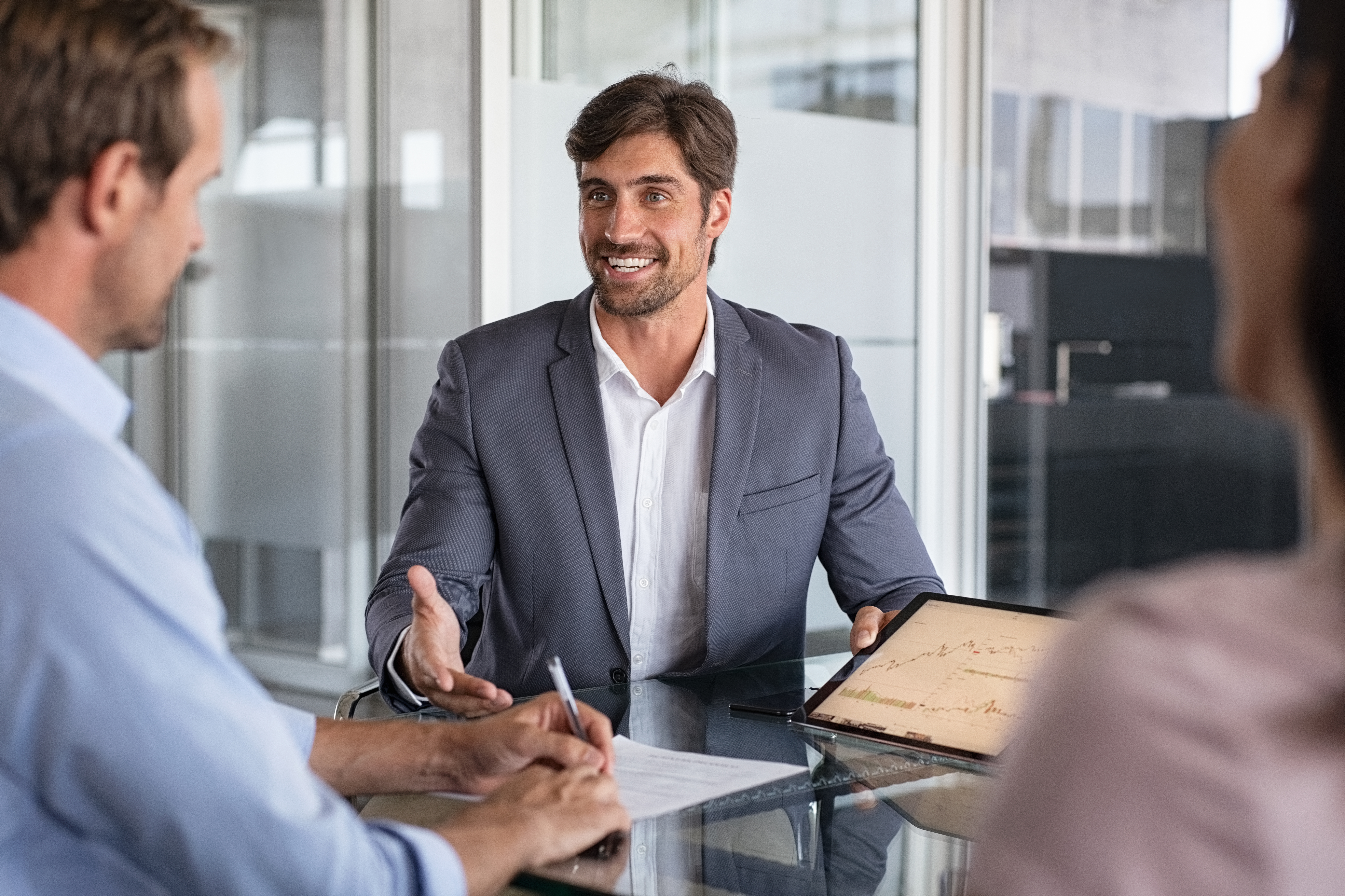 Insurance agents helping clients